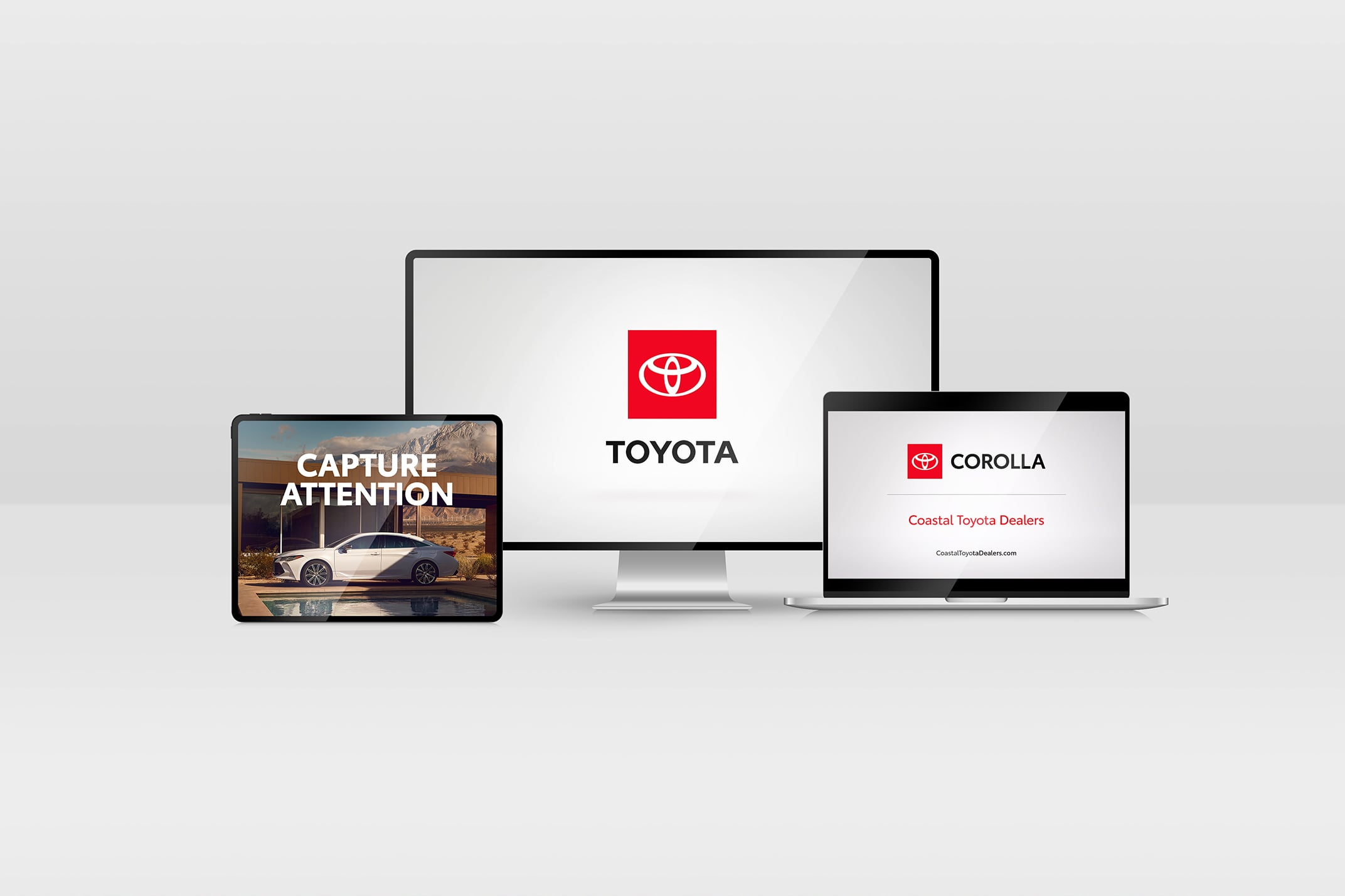 Videos of Toyota end tags and an animated super play within the screens of an iPad, computer and laptop.