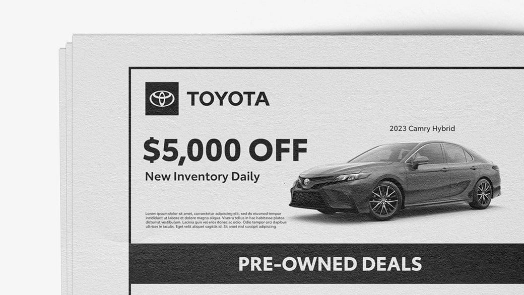 A black-and-white Toyota newspaper ad.