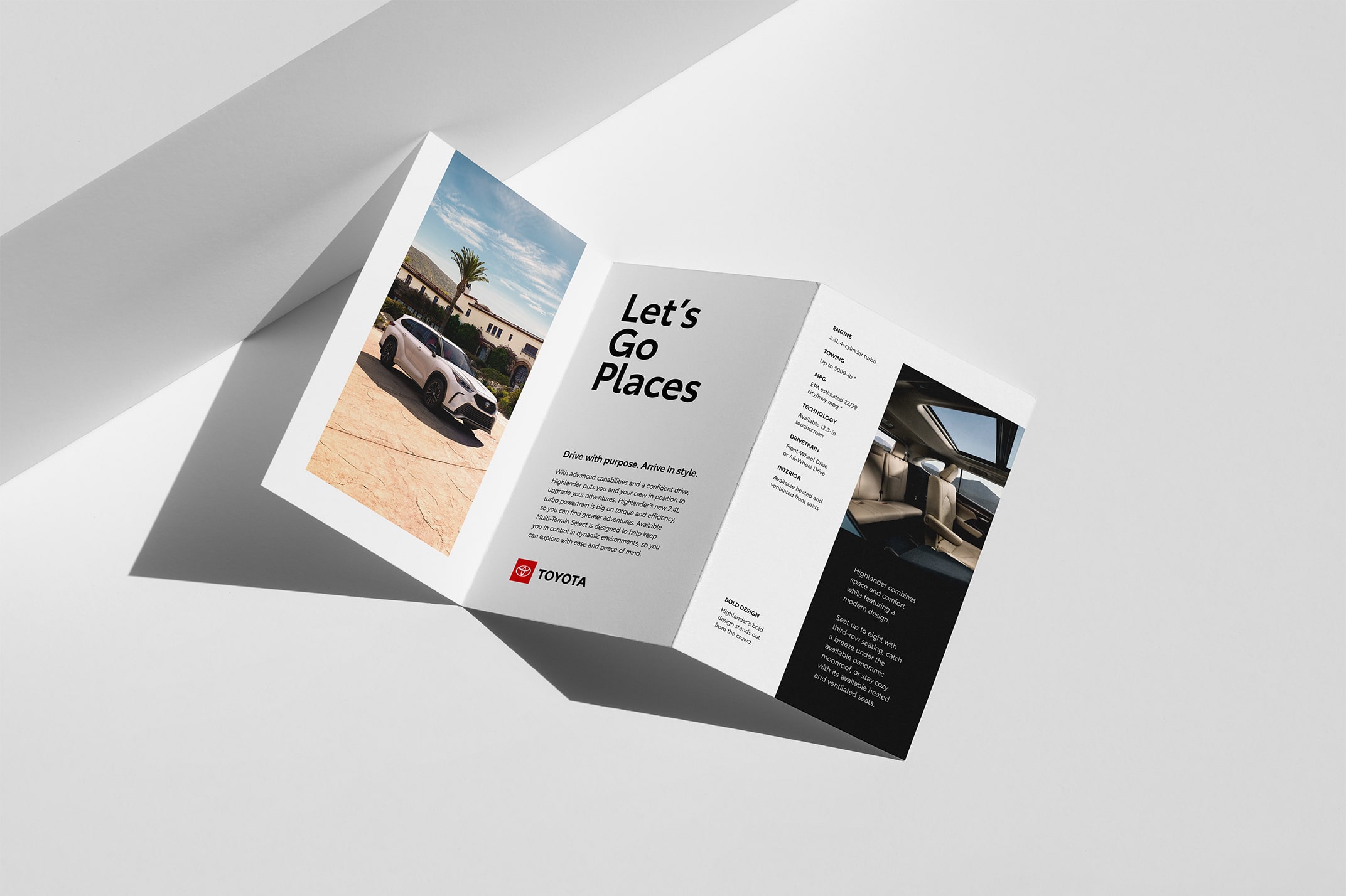 A brochure on a white backdrop. The brochure has imagery, the Toyota logo and copy with the headline “ Let’s Go Places.”