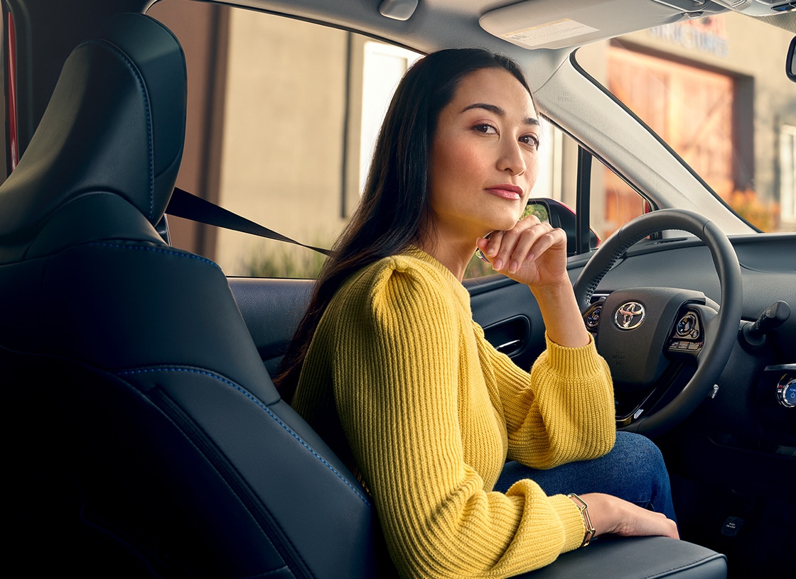 Woman in a Prius